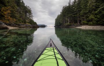 Green kayak tip pointing toward inlet 